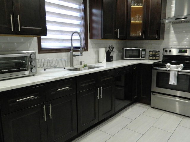 7086 Boulder Ct, Tobyhanna, PA 18466 - kitchen featuring stainless steel appliances, wall chimney exhaust hood, a sink, and tasteful backsplash