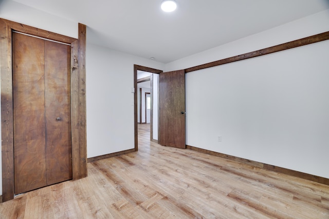8210 Pine Grove Dr, East Stroudsburg, PA 18301 - unfurnished bedroom with light wood-type flooring and baseboards