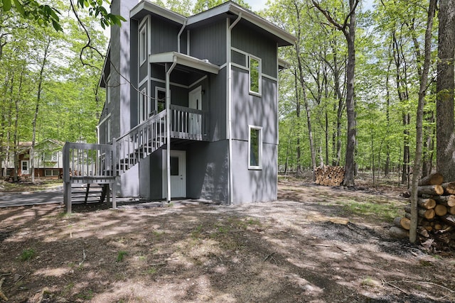 8210 Pine Grove Dr, East Stroudsburg, PA 18301 - view of front of house with stairs and a chimney