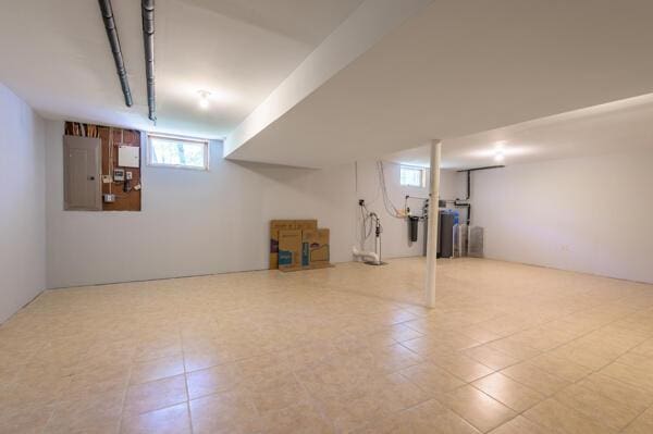 basement featuring electric panel