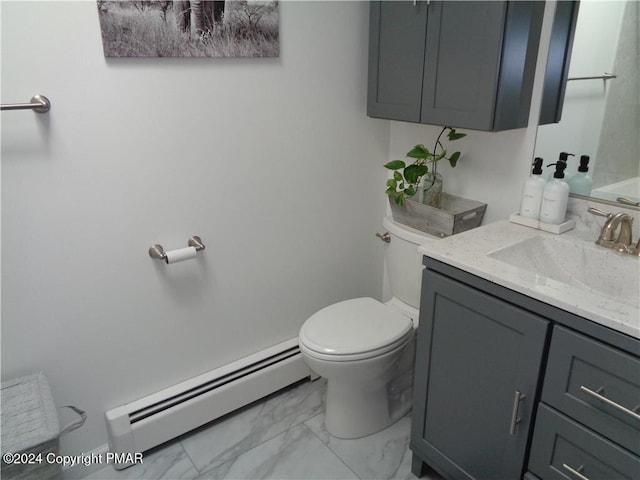 bathroom with marble finish floor, toilet, vanity, and baseboard heating