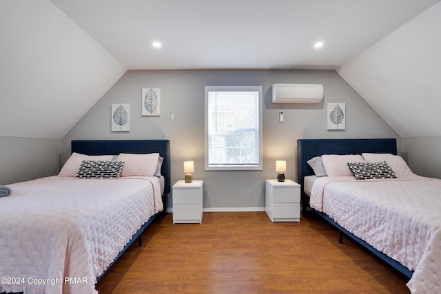 bedroom with baseboards, wood finished floors, vaulted ceiling, a wall mounted AC, and recessed lighting