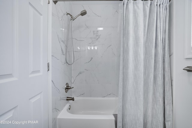 bathroom with shower / bath combo