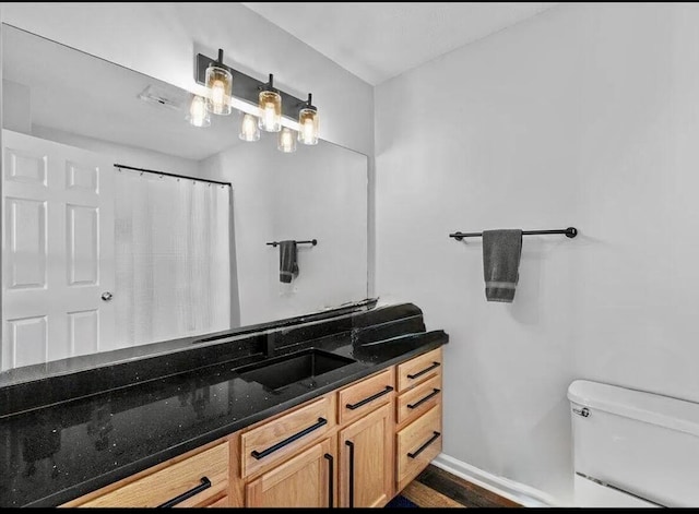 376 Linden Ct Unit 376, Tannersville, PA 18372 - full bathroom featuring vanity, toilet, and wood finished floors