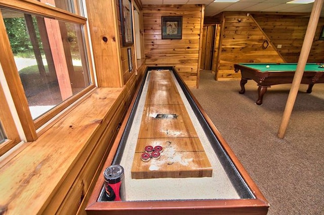 playroom featuring carpet, wooden walls, and pool table