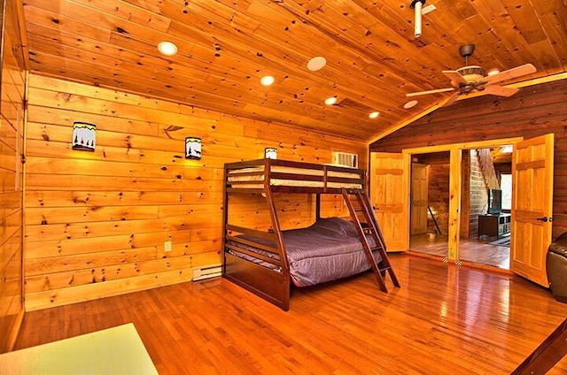 bedroom featuring wood ceiling, vaulted ceiling, wooden walls, and wood finished floors