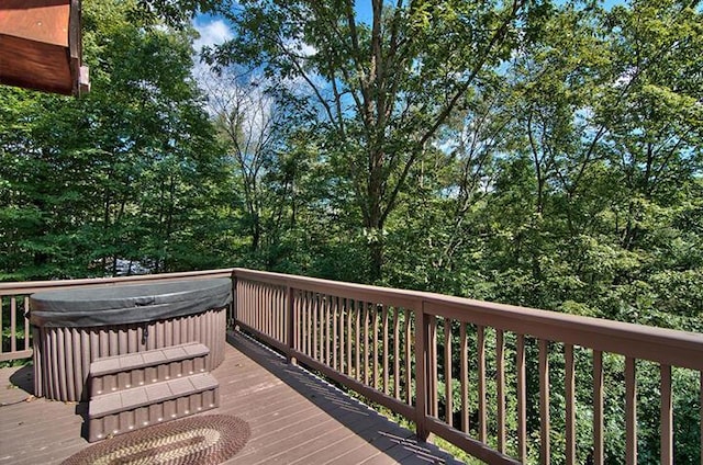 deck with a hot tub