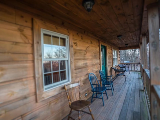 wooden terrace with covered porch