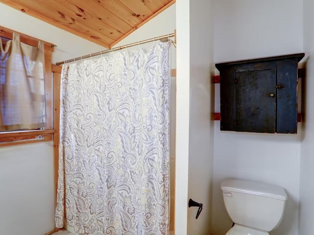 bathroom with vaulted ceiling, curtained shower, wooden ceiling, and toilet