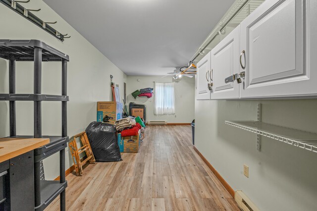1117 Belaire Dr, East Stroudsburg, PA 18301 - storage room featuring a ceiling fan and a baseboard heating unit