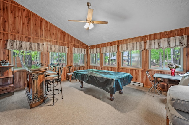 1117 Belaire Dr, East Stroudsburg, PA 18301 - rec room with vaulted ceiling, carpet, wood walls, a textured ceiling, and ceiling fan