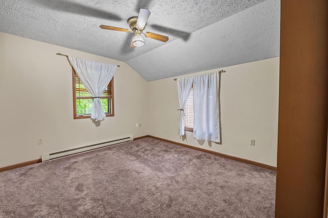 1117 Belaire Dr, East Stroudsburg, PA 18301 - spare room featuring a baseboard heating unit, healthy amount of natural light, a ceiling fan, a textured ceiling, and carpet floors