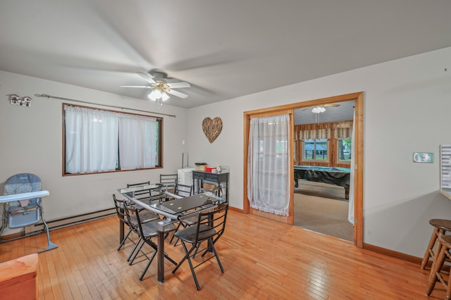 1117 Belaire Dr, East Stroudsburg, PA 18301 - dining space with ceiling fan, light wood-type flooring, and a baseboard radiator