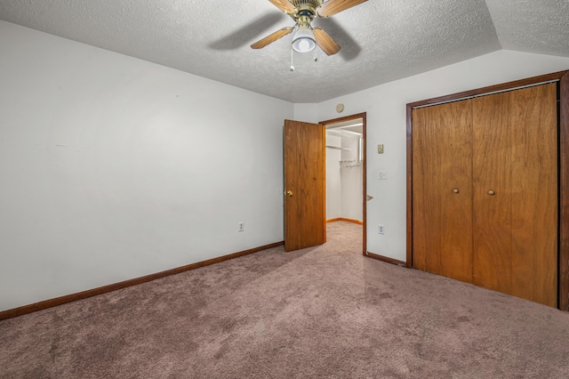1117 Belaire Dr, East Stroudsburg, PA 18301 - unfurnished bedroom with a closet, carpet flooring, a textured ceiling, and a ceiling fan