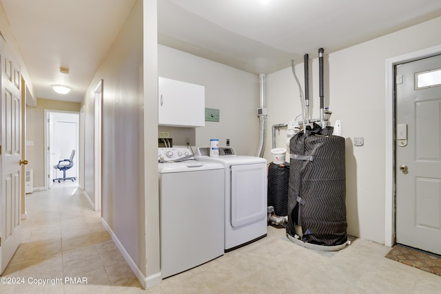 laundry area with cabinet space and washer and dryer