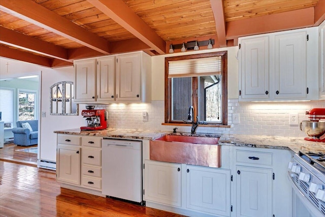 kitchen featuring gas stove, white cabinetry, a sink, and dishwasher