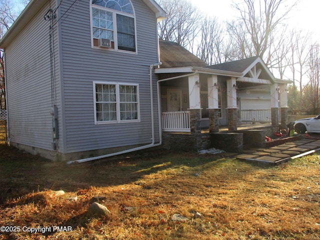 view of front of property featuring cooling unit