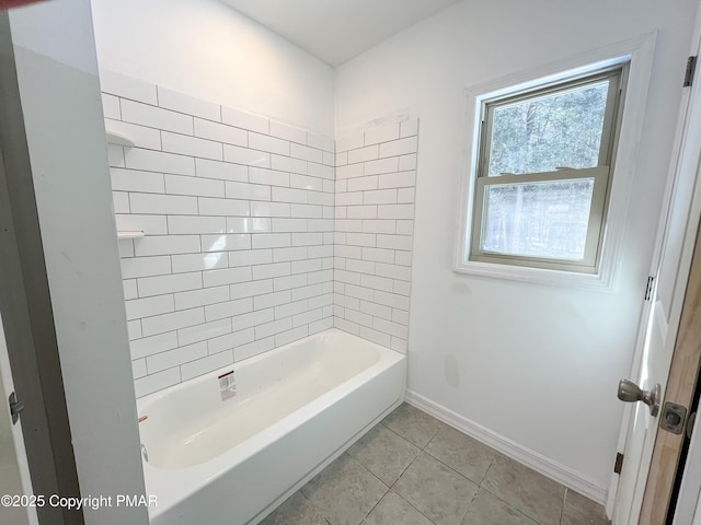 bathroom featuring baseboards and tile patterned floors