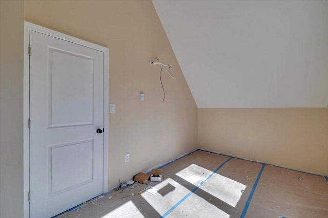 bonus room with vaulted ceiling