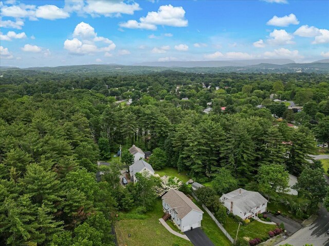 838 Cayuga Way, Stroudsburg, PA 18360 - aerial view of property and surrounding area with a heavily wooded area