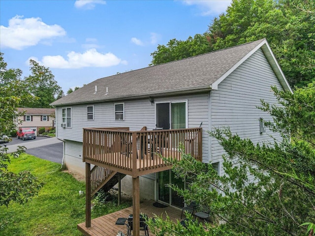 838 Cayuga Way, Stroudsburg, PA 18360 - rear view of property with a wooden deck, a shingled roof, and stairs