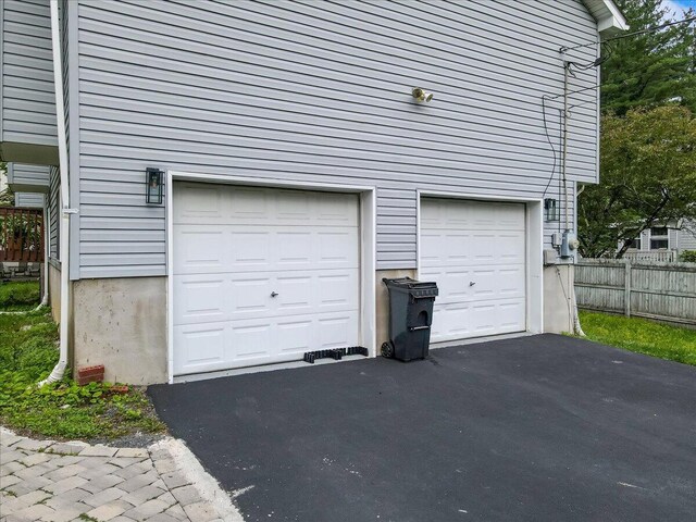 838 Cayuga Way, Stroudsburg, PA 18360 - garage with asphalt driveway