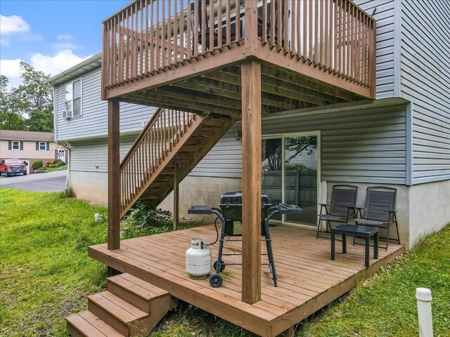 838 Cayuga Way, Stroudsburg, PA 18360 - wooden terrace with stairway and a lawn