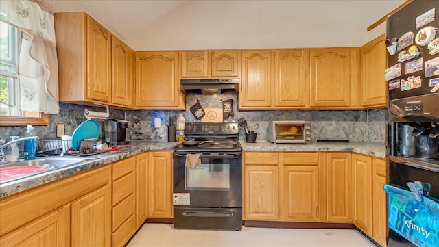 838 Cayuga Way, Stroudsburg, PA 18360 - kitchen with black appliances, under cabinet range hood, backsplash, and vaulted ceiling