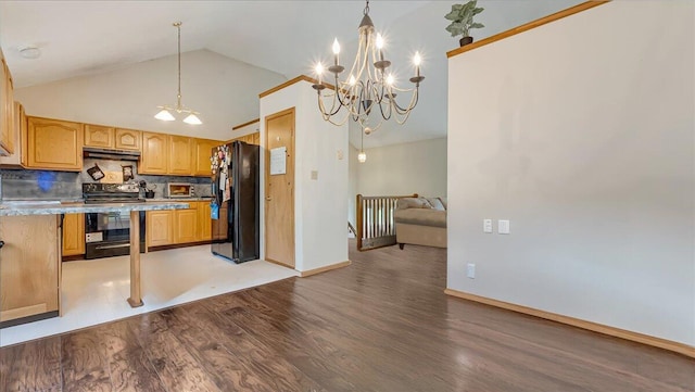 838 Cayuga Way, Stroudsburg, PA 18360 - kitchen with electric stove, freestanding refrigerator, wood finished floors, a chandelier, and vaulted ceiling