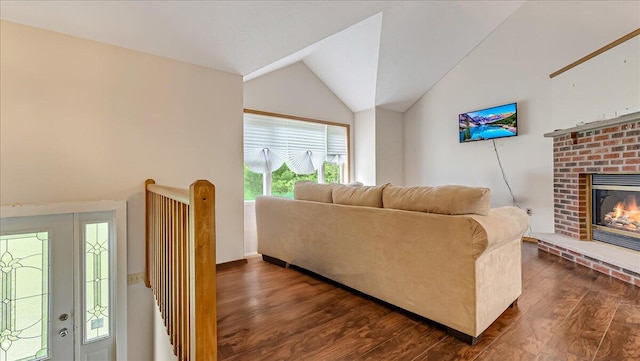 838 Cayuga Way, Stroudsburg, PA 18360 - living room with dark wood-type flooring, lofted ceiling, and a fireplace
