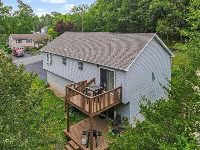 838 Cayuga Way, Stroudsburg, PA 18360 - back of house featuring a deck and a shingled roof