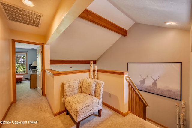 480 Spruce Dr, Tannersville, PA 18372 - sitting room featuring an upstairs landing, light colored carpet, and baseboards