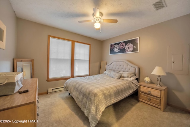 480 Spruce Dr, Tannersville, PA 18372 - bedroom featuring a baseboard radiator, light carpet, baseboards, and a ceiling fan