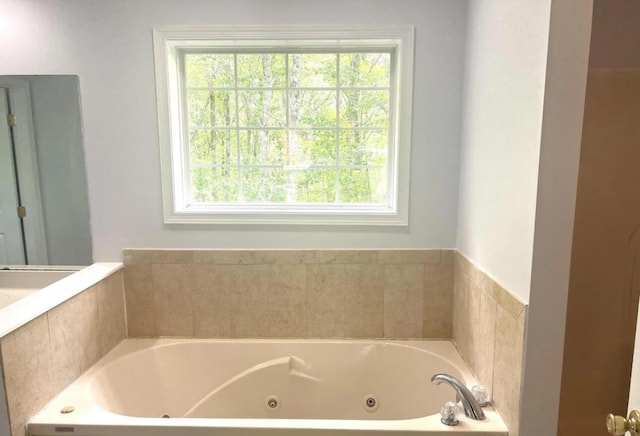 bathroom with a jetted tub