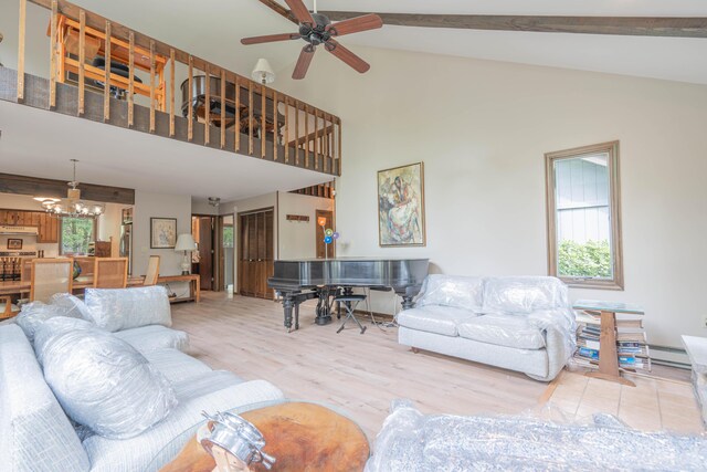 65 Maplewood Rd, Lake Harmony, PA 18624 - living room featuring a chandelier, wood finished floors, high vaulted ceiling, a ceiling fan, and beam ceiling