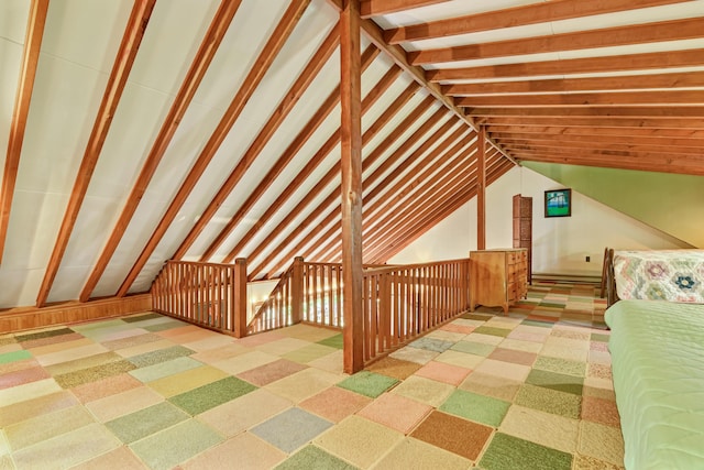 unfinished attic with a baseboard radiator