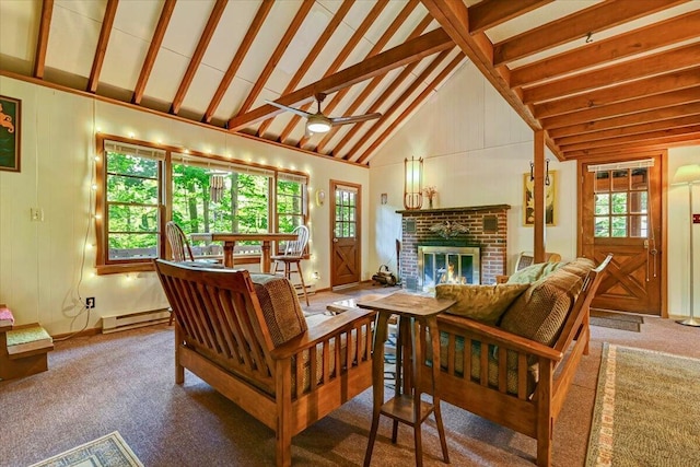 carpeted living room with a baseboard heating unit, a brick fireplace, and plenty of natural light
