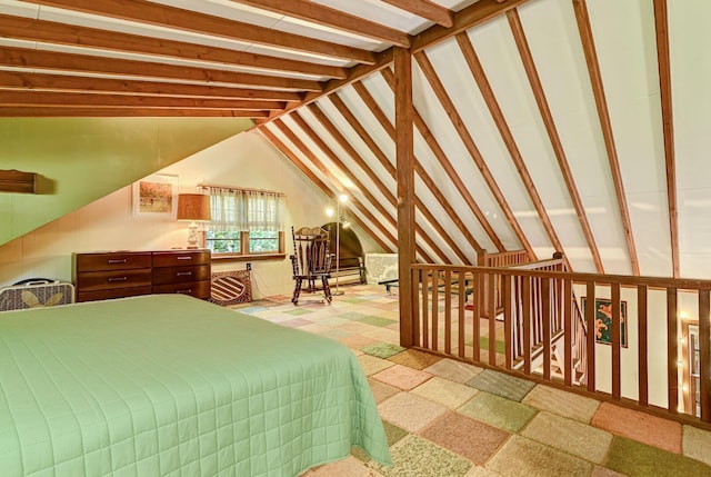 bedroom featuring lofted ceiling with beams
