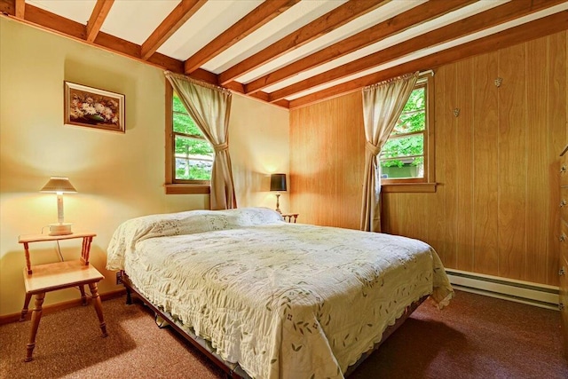 bedroom featuring baseboards, carpet, wooden walls, beamed ceiling, and a baseboard heating unit
