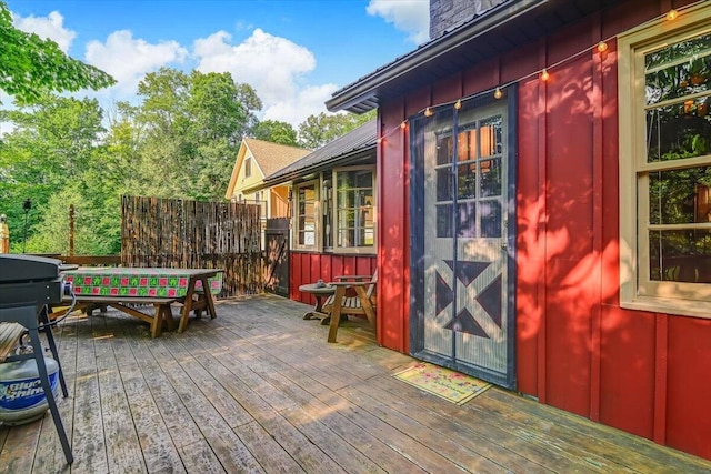 wooden deck with area for grilling