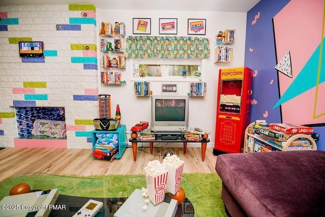 playroom with wood finished floors