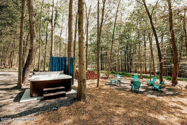 view of yard featuring a hot tub