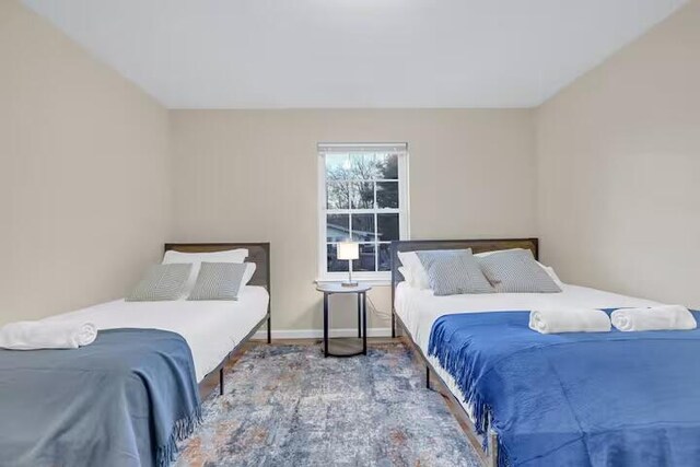 7075 Boulder Ct, Tobyhanna, PA 18466 - bedroom with wood finished floors and baseboards