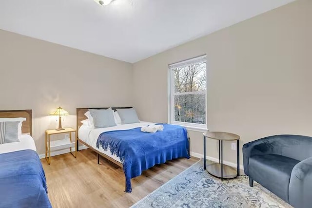7075 Boulder Ct, Tobyhanna, PA 18466 - bedroom with wood finished floors and baseboards