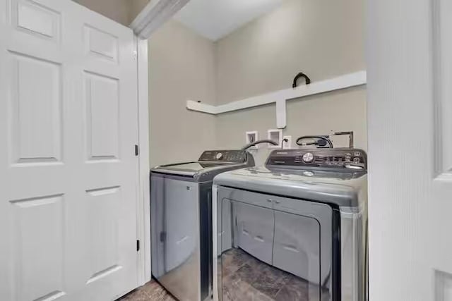 7075 Boulder Ct, Tobyhanna, PA 18466 - washroom with independent washer and dryer and marble finish flooring