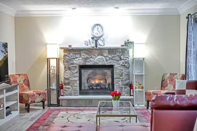 7075 Boulder Ct, Tobyhanna, PA 18466 - living area featuring ornamental molding, wood finished floors, and a fireplace