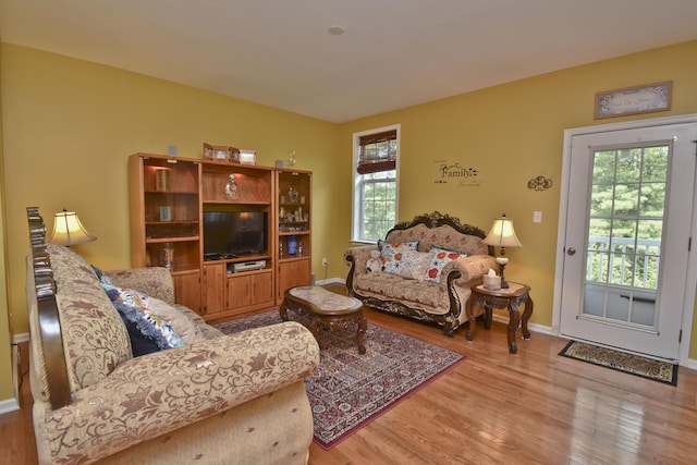 1785 Big Ridge Dr, East Stroudsburg, PA 18302 - living room featuring wood finished floors and plenty of natural light