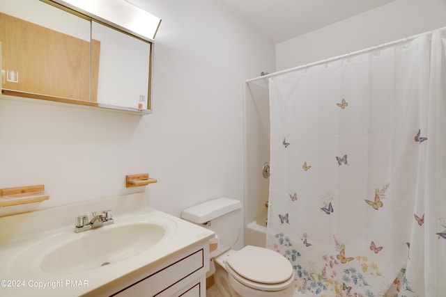 full bathroom featuring toilet, shower / bath combination with curtain, and vanity