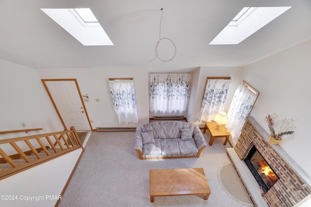 living room with carpet floors, a brick fireplace, vaulted ceiling with skylight, and baseboard heating