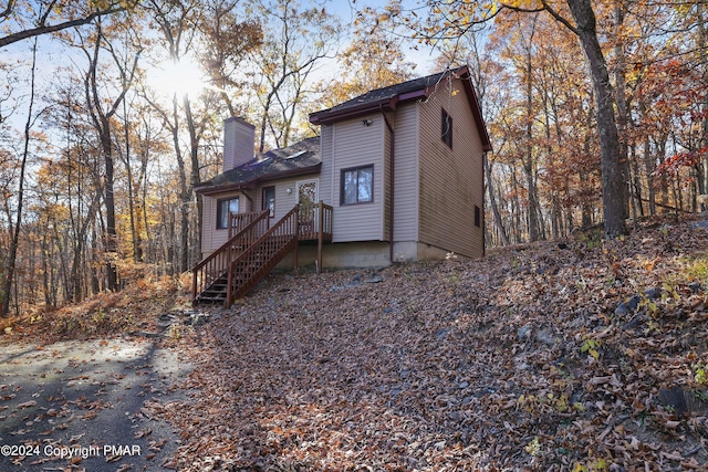 view of front of property with a chimney